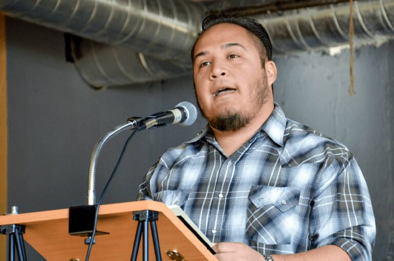 Poet Angel Garcia reading at a Writers Resist event in January 2017